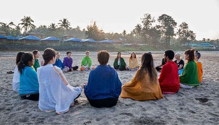 Oceanfront sunrise yoga, Goa